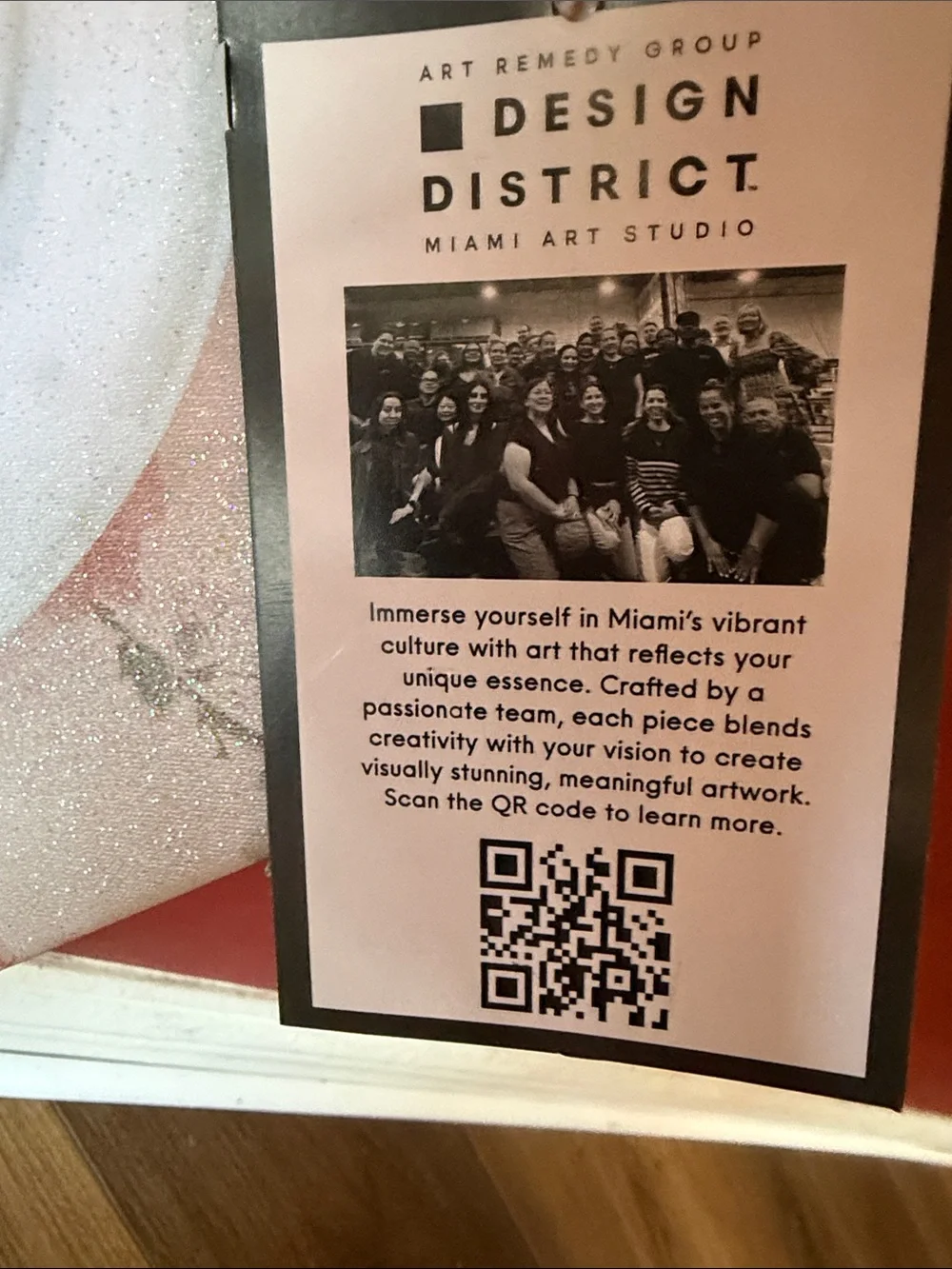 Design District Picture that Shows a Dog reading a Chanel book on the toilet